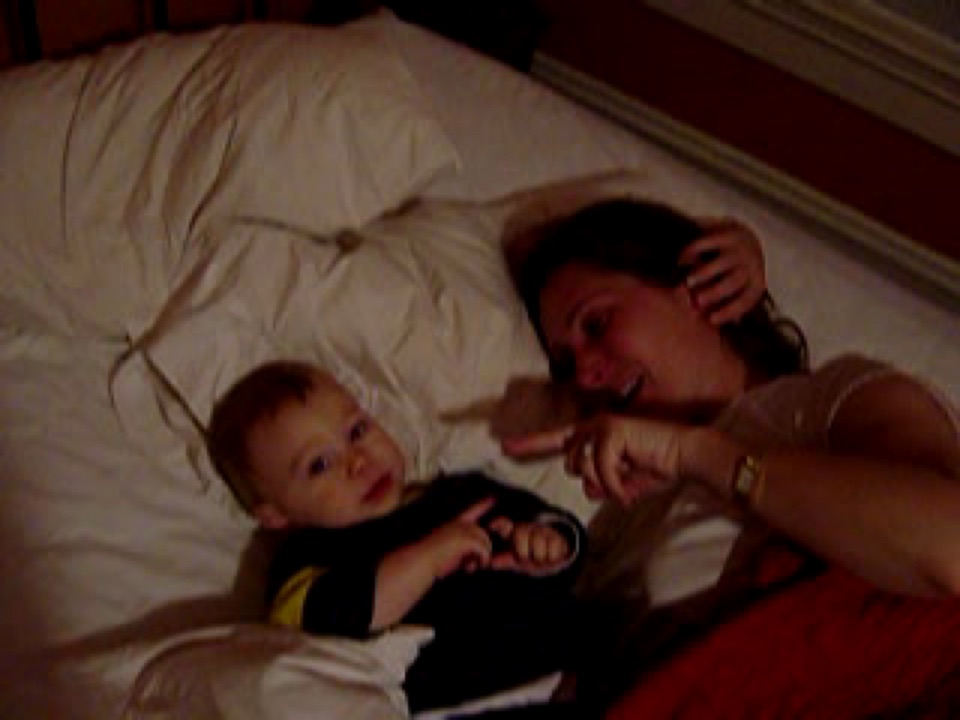 Mummy tickles Alex in bed. Tee-hee!