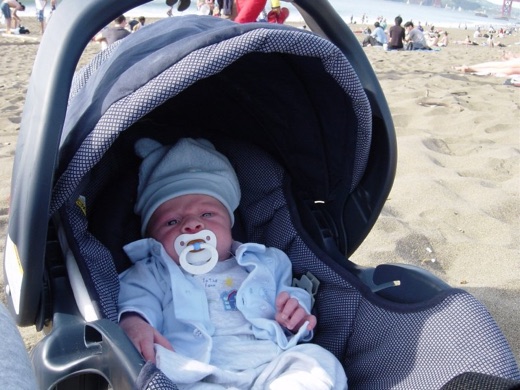 Alex on his first trip to the beach. He promises to work on his abdominal muscles for next time.