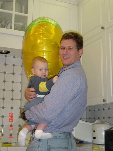 Alex got a helium balloon from a pal's first birthday party - he had lots of fun trying to eat it.