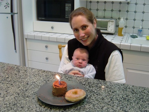 Alex and his mummy on his 4 week birthday. Yes, that's a (late) Krispy Kreme donut in the foreground.