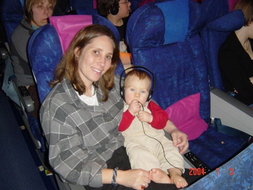 Here's Alex and mummy on the looong flight back to San Francisco. Give him a movie, and he's happy, for 5 minutes maybe...