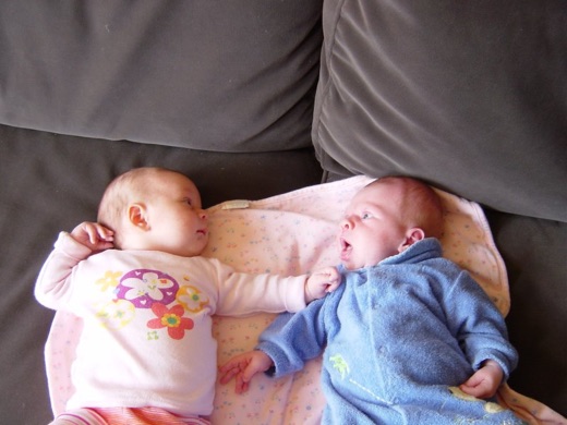 Alex and his little pal (Pearl Thompson). He's just starting to see faces at this point. How sweet...